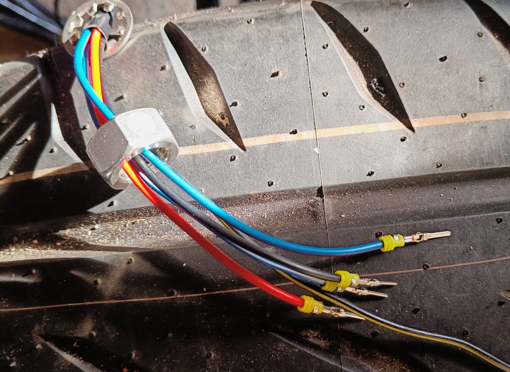 Image of new headlamp wires plus the additional black/yellow wire for side lamp ground only.