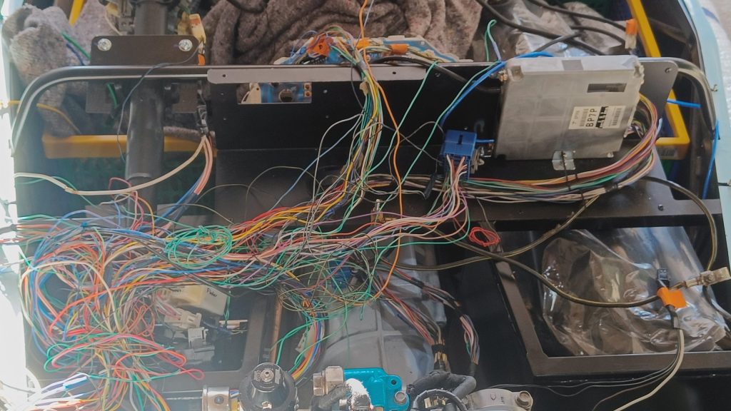 Image of unwrapped main loom lying in scuttle area ready for further modification.