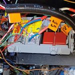Image of wiring side of fuse box under construction