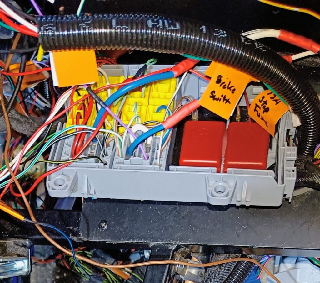 Image of wiring side of fuse box under construction