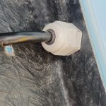 Image of rear light cabling passing through wing and body using a cable gland.