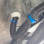 Image of rear light cabling passing through wing and body using a cable gland.