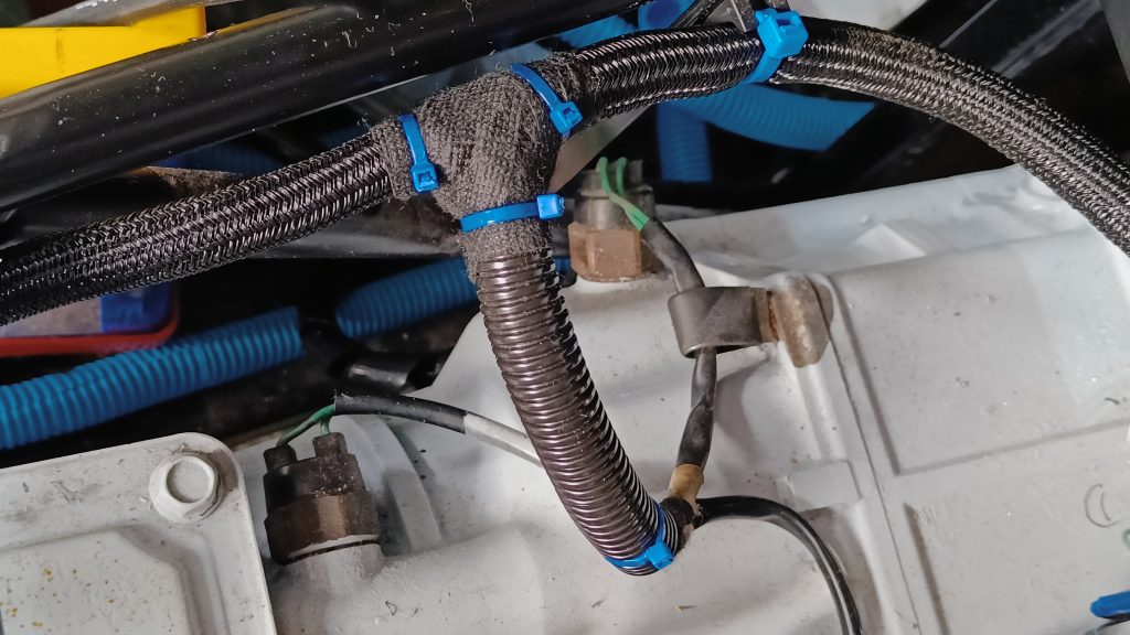 Image of speed sensor, reverse switch and neutral switch loom connections.