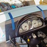 Image of dash panel in position and fixing holes drilled.