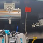 Image of expansion tank and battery cabling installation.
