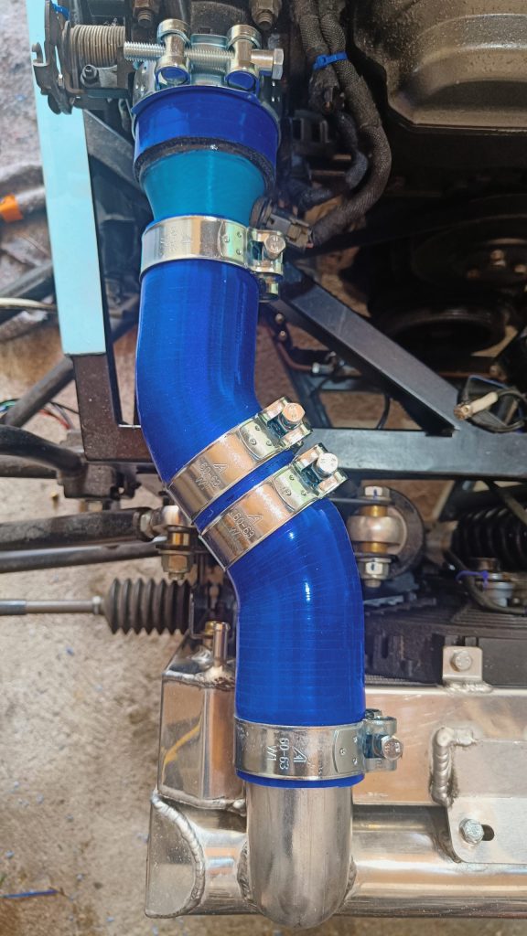 Image of intercooler connection to inlet manifold.